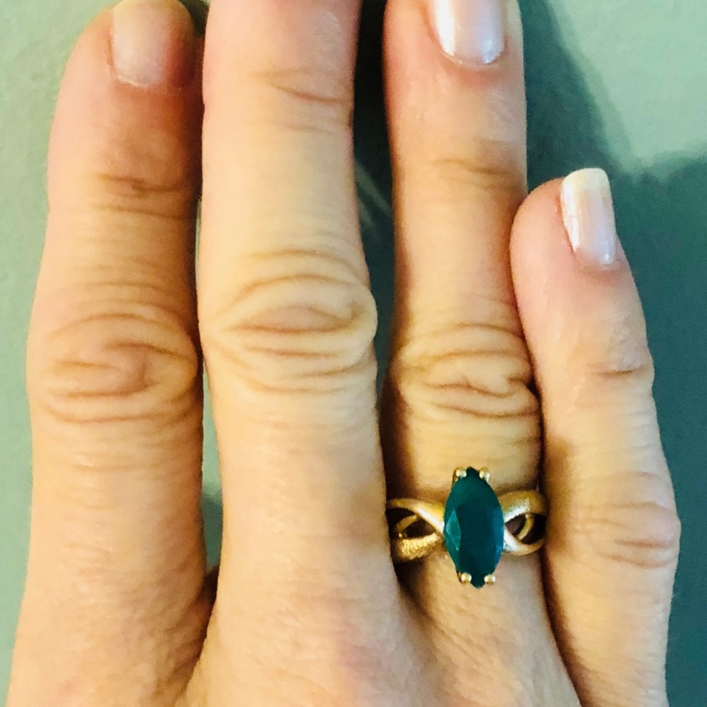 Pretty 10k simulated emerald ring.